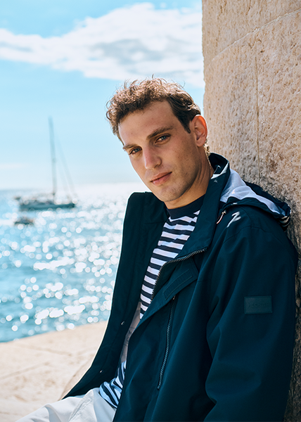 Striped navy look Portrait of a man with a blue jacket and striped t-shirt