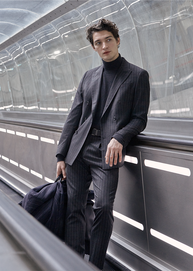 Man with an elegant pinstriped suit