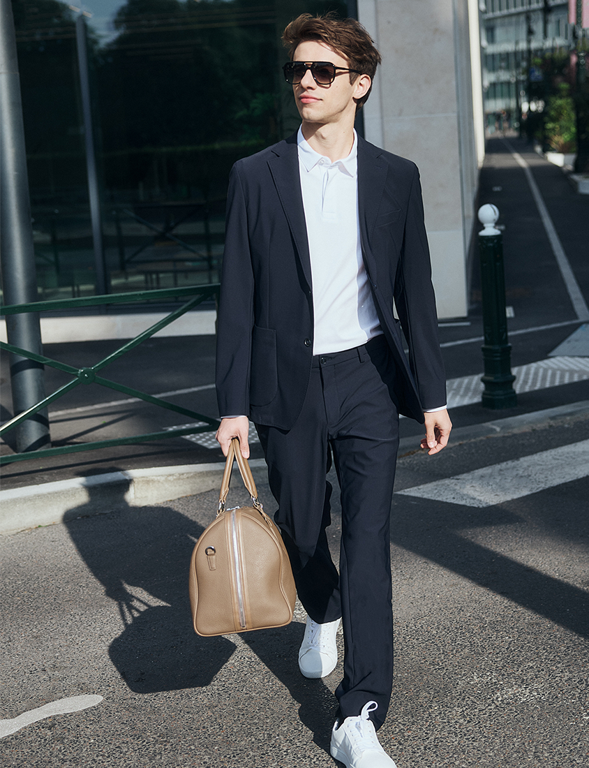 Man in a mix and match suit